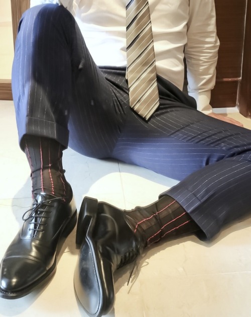 Suited up in black captoes
