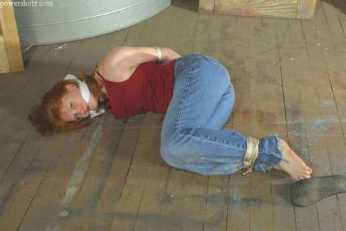 zippo077:  Abducted off the street and kept in a grimy warehouse before being shipped overseas, Katherine makes a desperate attempt to escape. In her struggles she  only succeeds in losing her flip flops and getting filthy from rolling around on the