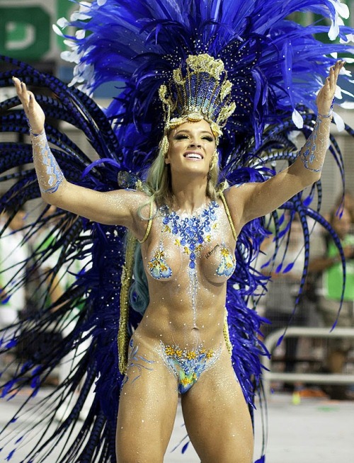 Porn photo Naked woman in body paint at a Brazilian carnival.