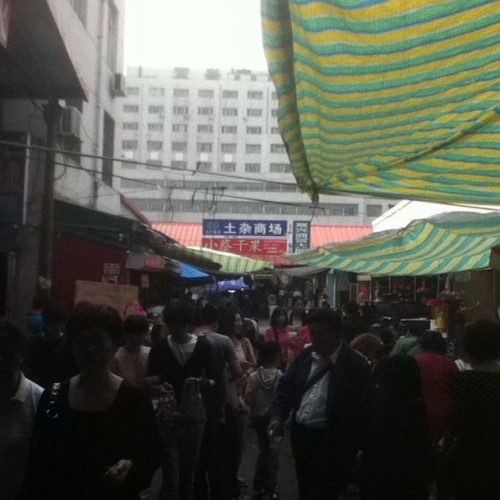 Huge black-fruit-market. Even fruit had a adult photos