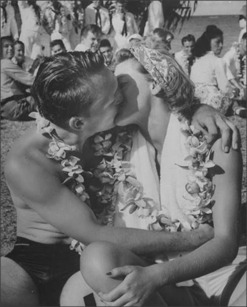 Sailor kissing girl during a Luau for Navy personnel on leave, 1945Eliot Elisofon