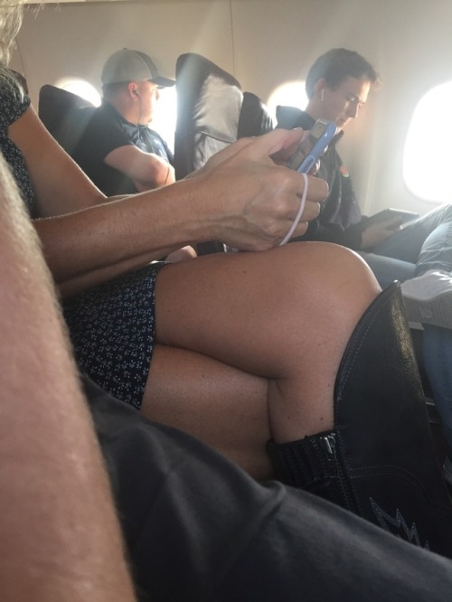 Check out the hot milf seated next to me on this flight. Great legs and nice lacy bra showing. What 