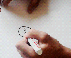 juicybbieber:  Justin Bieber drawing a self portrait  