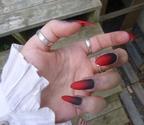 vinceaddams:I painted my nails red and black and I must say I’m very pleased with them.# how did u d