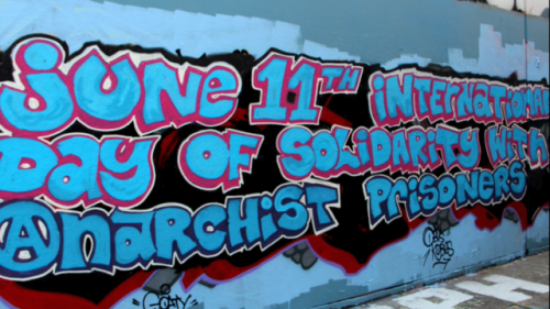 Solidarity graffiti for June 11, International day of solidarity with anarchist prisoners