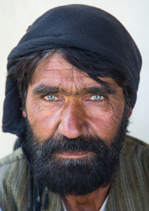 Portrait of an afghan man with clear eyes, Badakhshan province, Khandood, Afghanistan.  Taken o