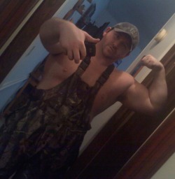 muscledlust:  Bubba showing us a muscle!  Damn I love rural muscle! 
