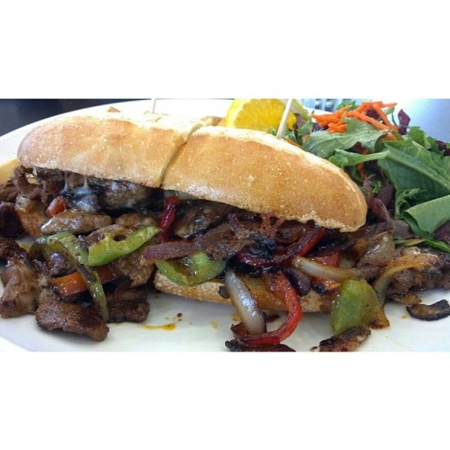 Philly. Steak strips with bell peppers, onions, mushrooms, and jack cheese on a French roll. #food #