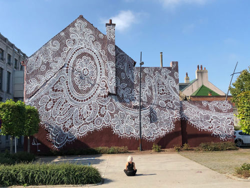 Warsaw-Based Artist Spray-Paints A Beautiful Lace Mural On The Side Of A French Lace MuseumThe Frenc