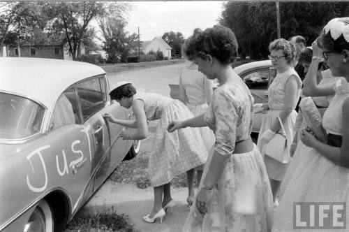 Decorating the newlyweds’s car(Michael Rougier. 1961)