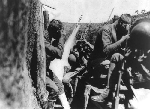 U.S. soldiers putting on gas masks