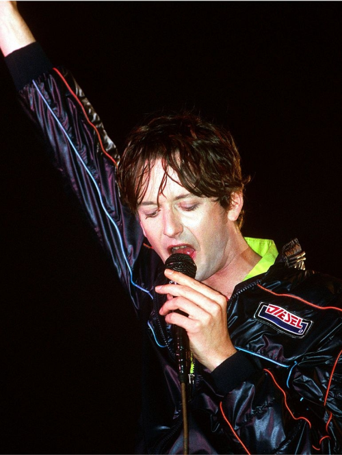 shiteliife:jarvis with pulp performing live onstage, t in the park -july 1996. photo by mi