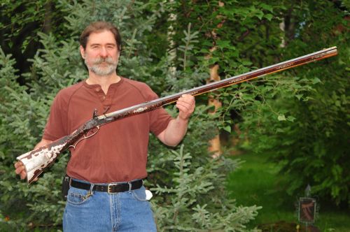 A beautiful contemporary made flintlock long rifle handcrafted by Jud Brennan.  Well done Mr. Brenna