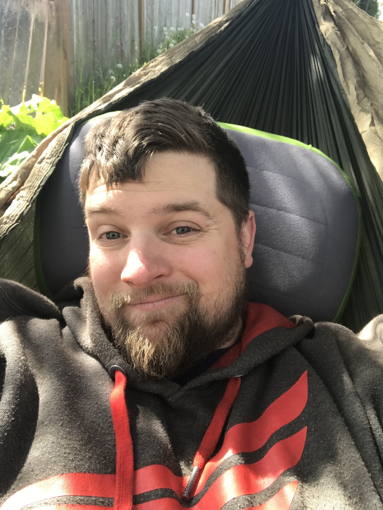 Enjoying the sun and reading in the hammock, Freya says hi