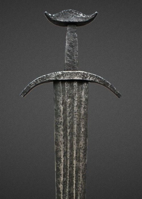 art-of-swords:  Medieval Sword Made in the 10th - 11th century style Dated: 19th century Measurements: overall length 94cm; blade length 80.5cm; handle length 9cm; quillon 19cm; blade width 6.8cm The tang is bare with no grip and has a guard which curves
