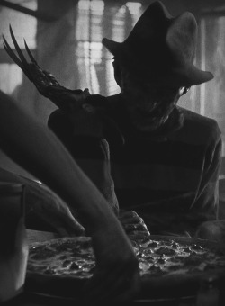 slobbering:  Freddy was a master pizza cutter.