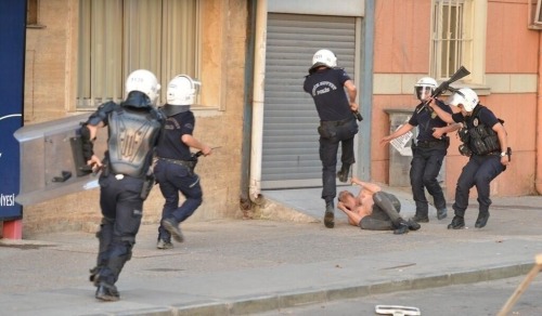 Police beating Turkish rebel. Fuck the police.