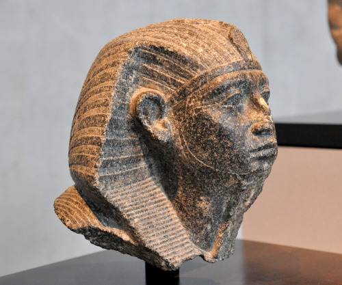 Head of the 12th Dynasty pharaoh Senusret III (r. 1878-1839 BCE), shown with youthful features; orig