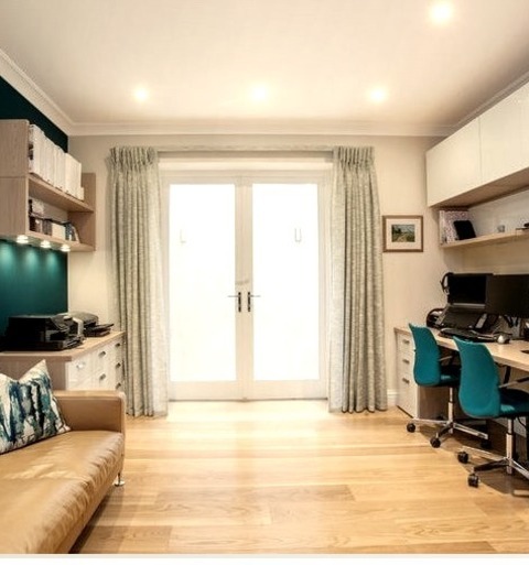 Underground Basement LondonLarge Modern Basement Design With A Light Wood Floor, White Walls, And No