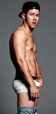 celebrtybulges:  Nick Jonas grabbing his bulge in his underwear for Flaunt Magazine