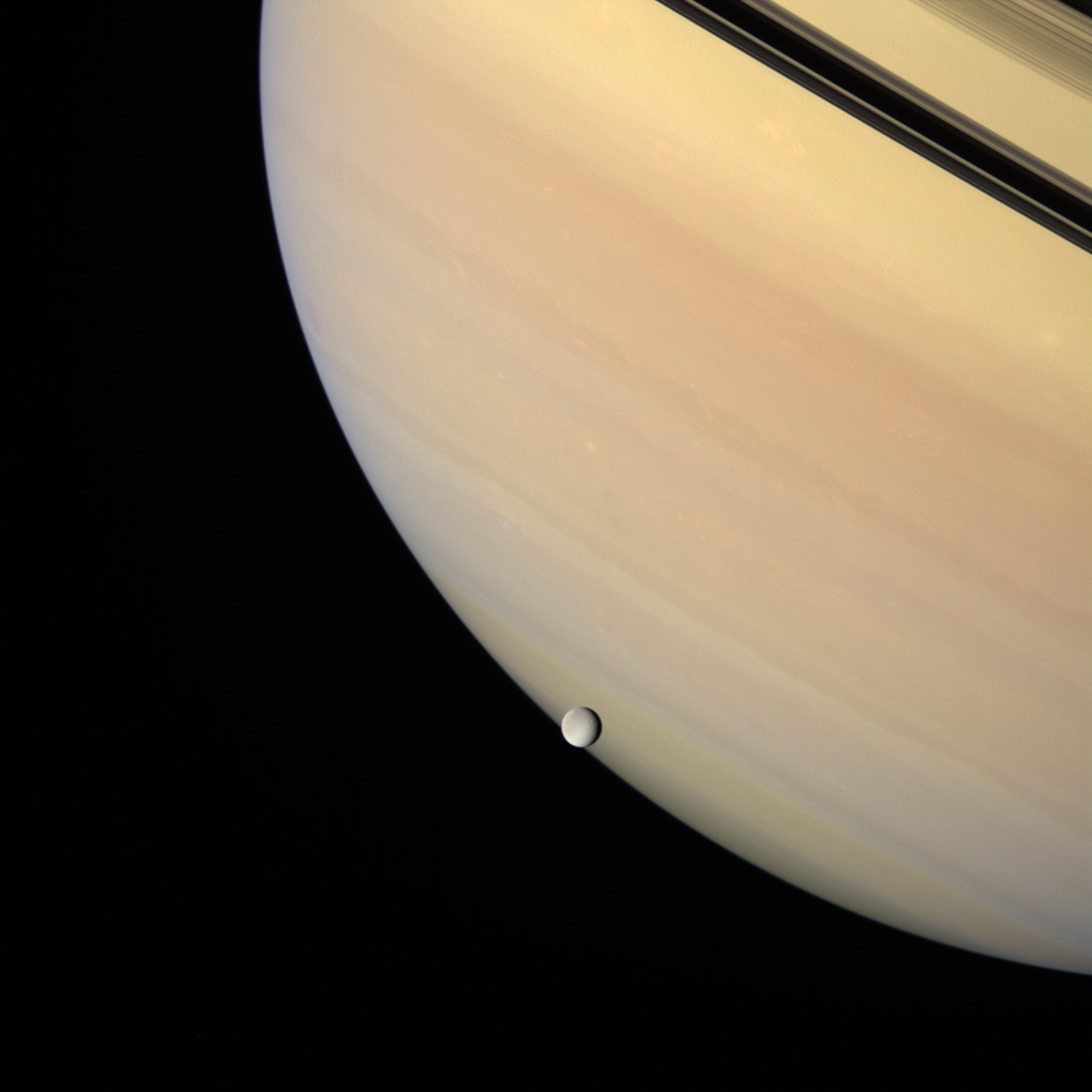 astronomyblog:  Rhea and Saturn by Gordan Ugarkovic
