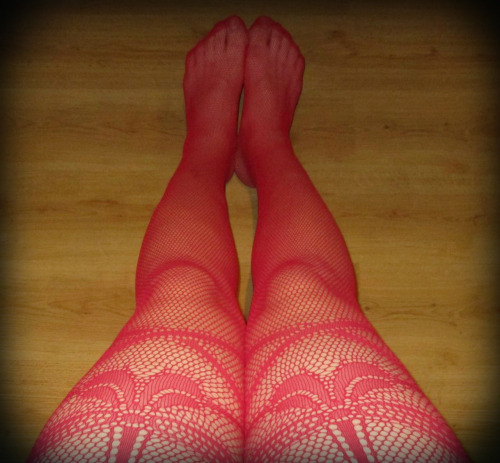 Red mock suspender fishnet pantyhose