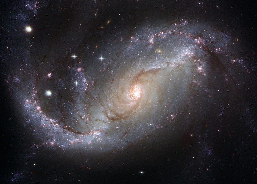 Barred Spiral Galaxy NGC 1672 by NASA Hubble