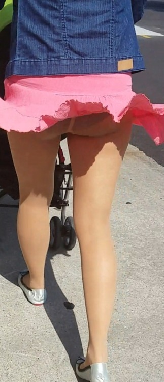 hotwifespantyhose: Wearing my miniskirts on a windy day was a great idea.  I love flashing my ass an
