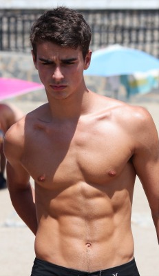 itsswimfever:  Tanned, toned beachboy…