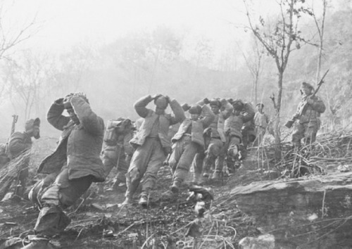 georgy-konstantinovich-zhukov: “April 1951, Chinese prisoners trudge down a hill under escort 