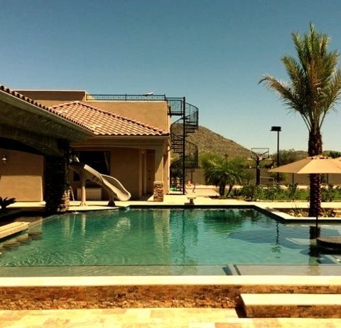Pool Water Slide Inspiration For A Large, Classic Backyard Remodel With A Custom-designed Lap Water Slide