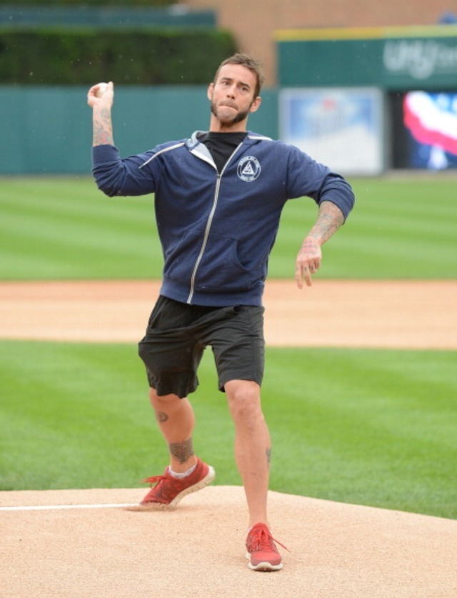 joannhutch1976:  Cm punk throws out the first pitch prior to the game between KC