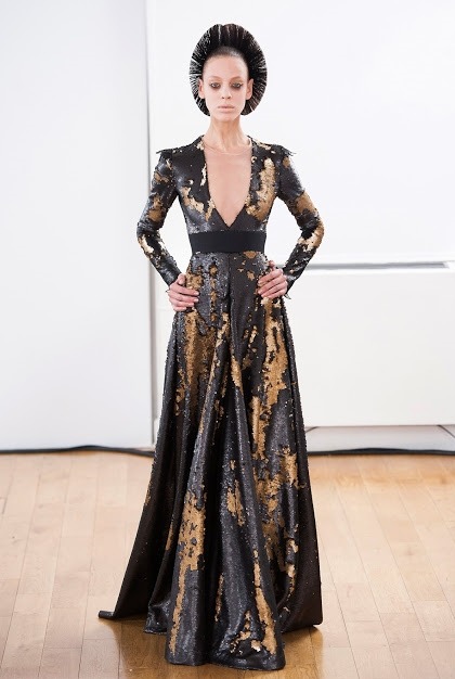 An edgy black dress with golden decay by Julien Fournie. And may I say the hair has quite an edge to