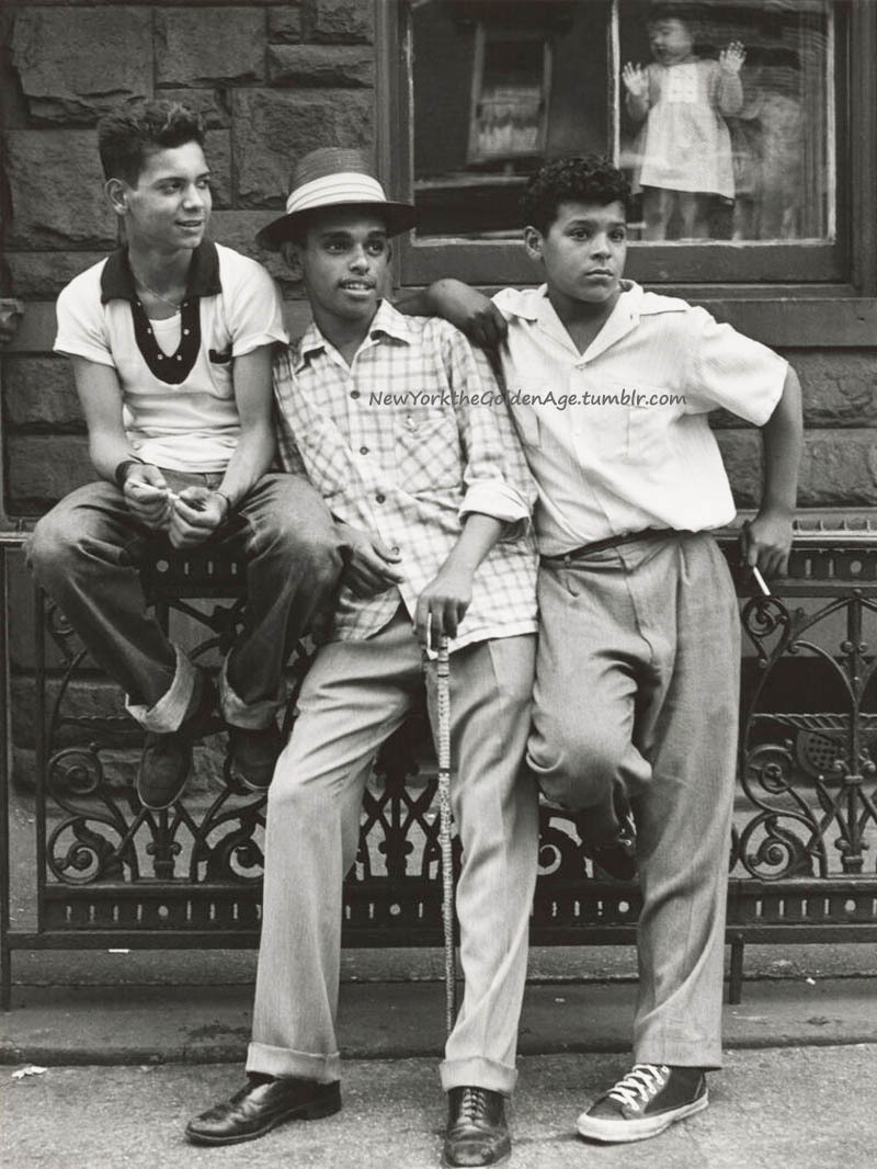 newyorkthegoldenage:Three young men, East Harlem, ca. 1950. Little girl in the window.Photo: