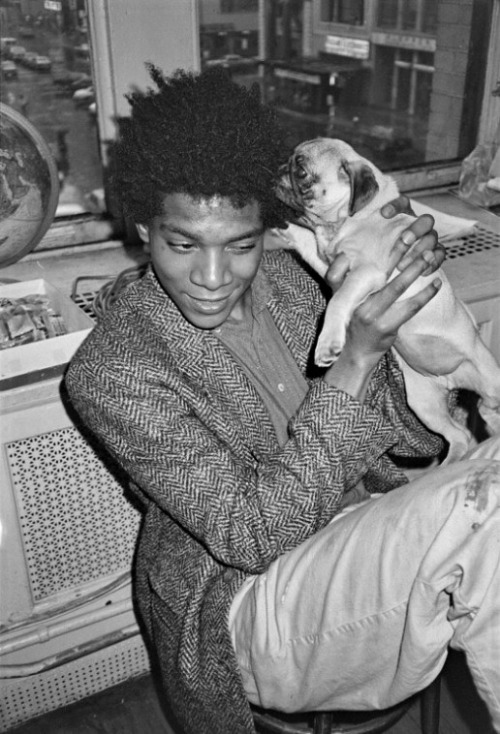 twixnmix:Jean-Michel Basquiat with a pug at Andy Warhol’s studio, 1984.Photos by