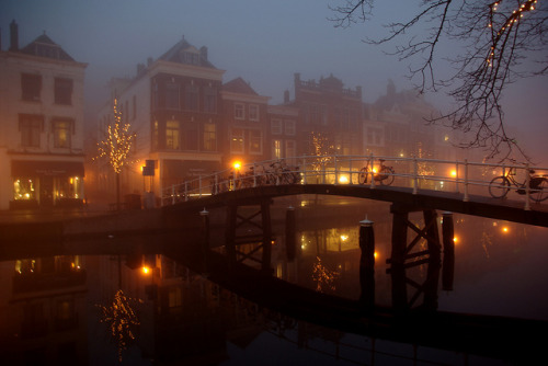   (by karstenfotos)  Amsterdam   You can just lock your bike on a bridge? Not at the UofA lol get jacked instantly