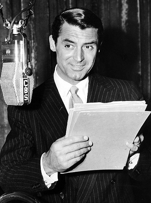 archiesleach:Cary Grant hosting a radio program, c. 1940s.
