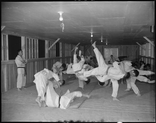 Japanese internees conducting a Judo class at Rowehr Relocation Center in Arkansas, World War II.