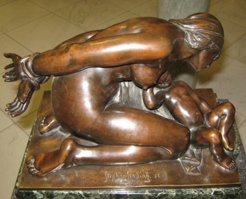 aanonymouse4o:  The next statue depicted a nude woman, her hands tied behind her by thongs kneeling 