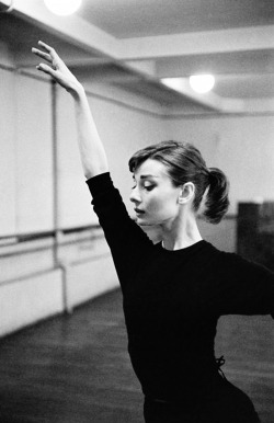 rareaudreyhepburn:  Audrey Hepburn with ballet coach Lucien Legrand, the first dancer and choreographer for the Paris Opera Ballet, at a dance rehearsal for her film Funny Face, Paris, France, 1956. 