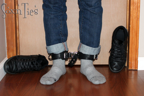 soxnties:  He likes these over the door wrist restraints more than I do… Even on tiptoe I couldn’t get loose… The hotter part came later when he ballgagged me and left me there to hang around for awhile, drooling… 