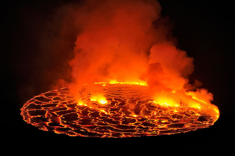 sixpenceee:  The permanent lava lake of the Nyiragongo Crater is the biggest in the