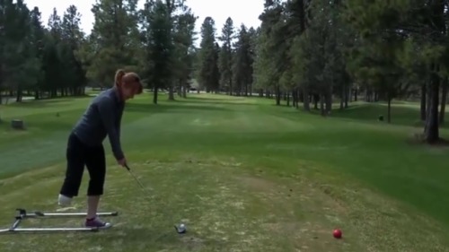 RBK amputee with converse shoe on her only leg plaing golf