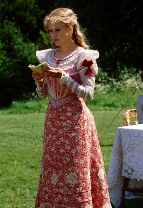 costumeloverz71:Cecily (Reese Witherspoon) Red dress… The Importance Of Being Earnest (2002).