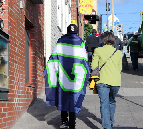 pikeplacemarketseattle:  Seahawks spirit was on full display Friday with produce sellers, craftspeople, shoppers and retailers showing their 12th Man pride.  Market merchants Quality Cheese, The Confectional, Pike Place Flowers, La Mexicana and others