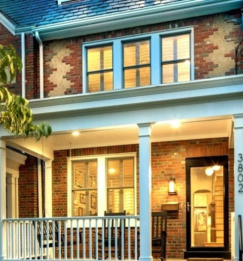 Brick DC MetroExample Of A Mid-sized Transitional Three-story Brick Townhouse Exterior Design