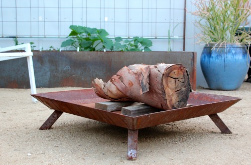 Welded steel raised bed planters, trellis and fire bowl by Robert Dougherty.