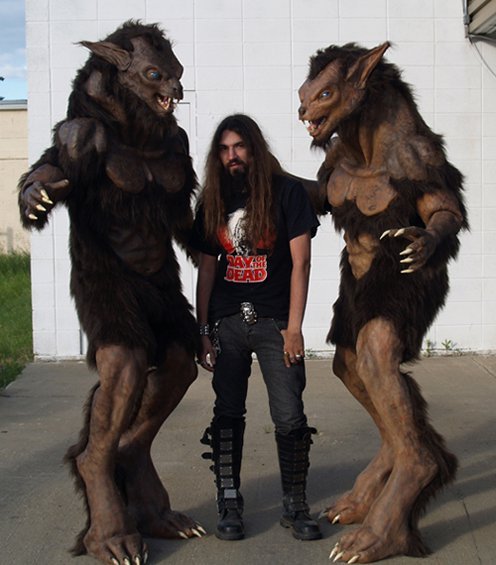 Ravenous EFX’s Travis Shewchuk poses with a couple of werewolves they created. #WerewolfWednes