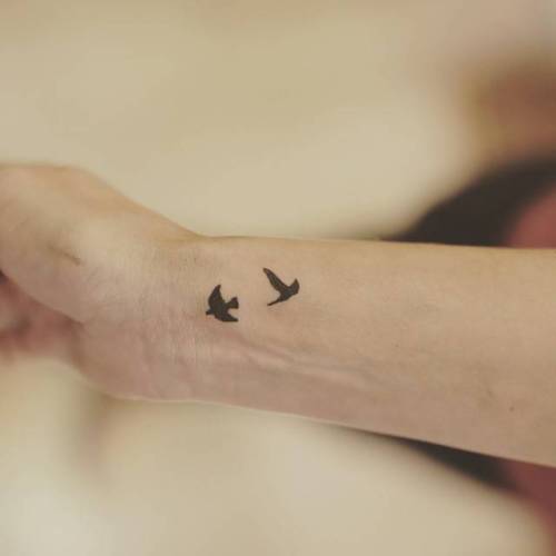 Little Tattoos — Two little birds on the wrist. Tattoo artist: Lu...