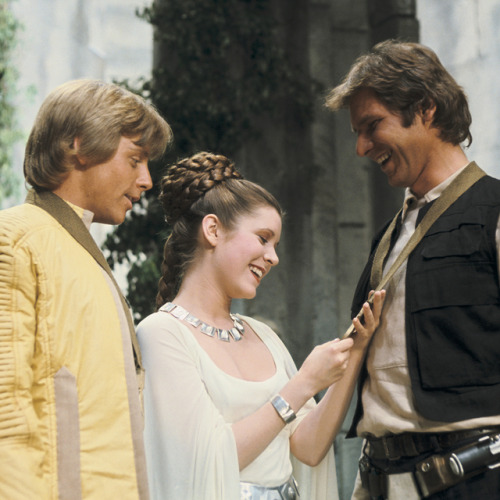 tcm:Mark Hamill, Carrie Fisher, and Harrison Ford in STAR WARS: EPISODE IV – A NEW HOPE (‘77)